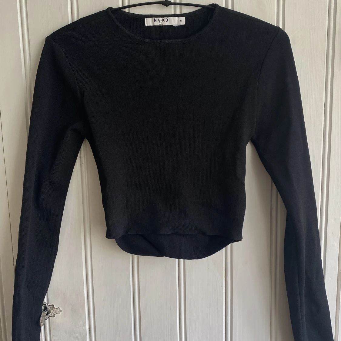 Stickad topp med öppen rygg - 90