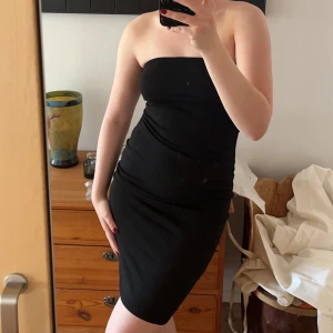 Svart tubklänning  - Oanvänd storlek M