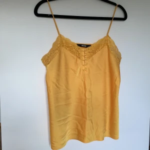 Linne i färg  - Färgglatt linne i storlek M, använd ca 2 gånger