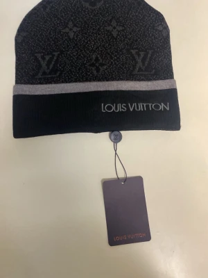 Black beanie - Item: Beanie / Hat Condition: New with tags Color: Black Size: One size Gender: Unisex  Description: Black knitted beanie. Soft and comfortable to wear, keeps your head warm. Simple everyday design with a folded cuff. Suitable for daily use.