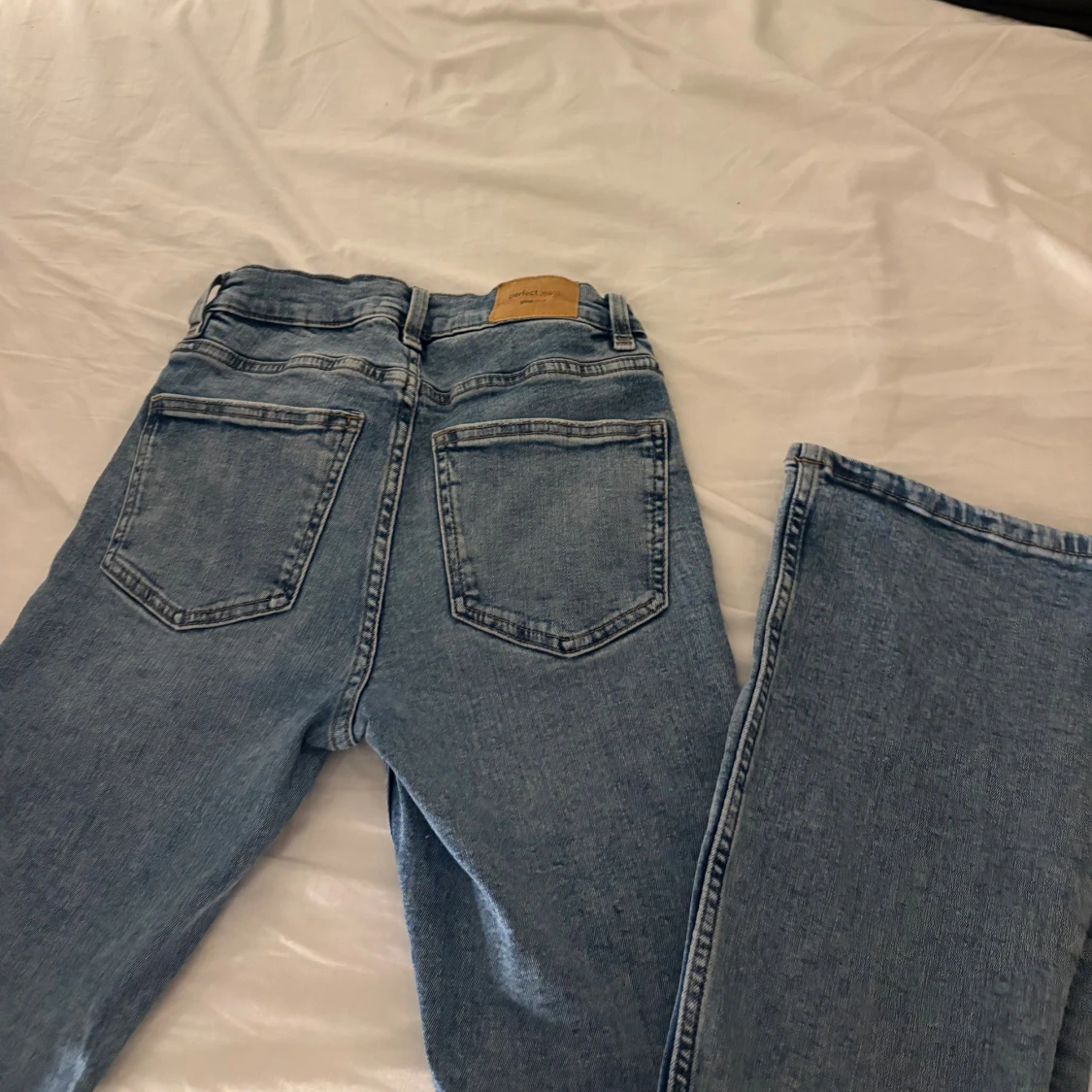 Ljusblå bootcut jeans - 2