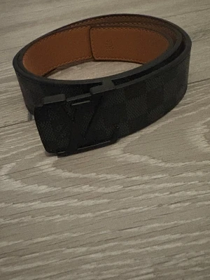 Svart rutigt bälte - Snygg rutigt bälte