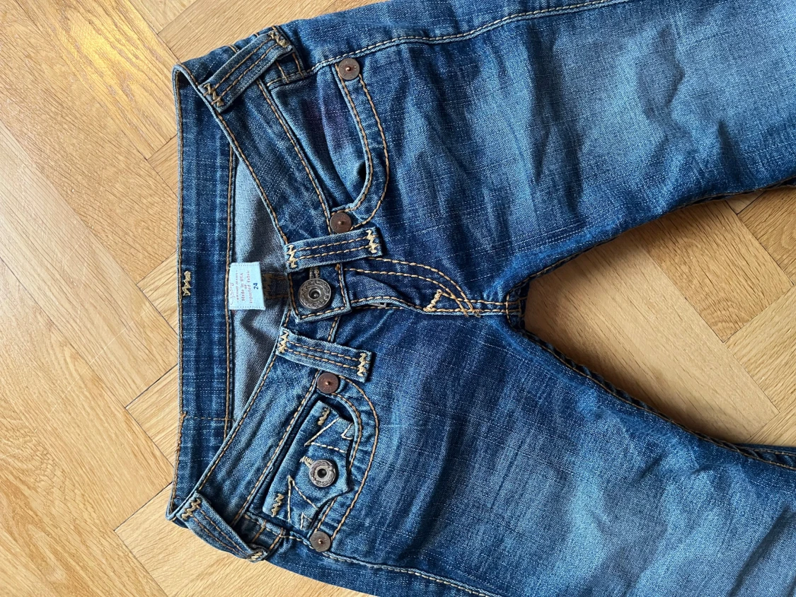 Vintage Lågmidjade true religion bruna/gula sömmar