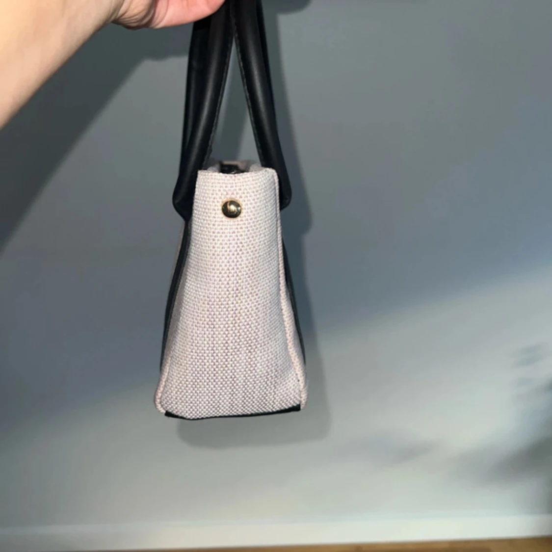 Beige och svart handväska i canvas - 1