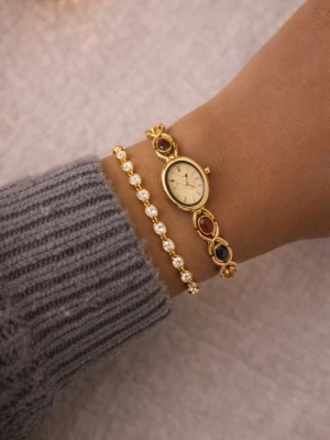 Vintage guldklocka  - Fint skick med ett helt nytt batteri och justerbart armband 