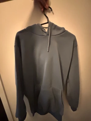 Ljus blå Hoodie - En ljus blå hoodie
