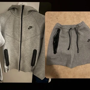 Grå Nike Tech Fleece set - Köpt detta år, blivit för liten för mig men i riktigt bra skick, tröjan är xs men passar s och shorts är s. 
