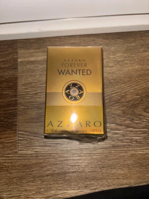 Azzaro Forever Wanted Elixir 50ml - Azzaro Forever Wanted Elixir, 50 ml. En exklusiv parfym i en snygg guldförpackning. Perfekt storlek för att ta med sig och ett statement för dig som vill sticka ut.