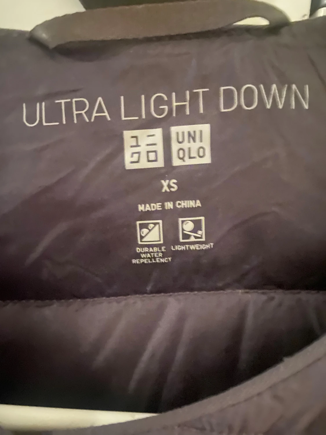 Grå dunjacka från Uniqlo XS - 2