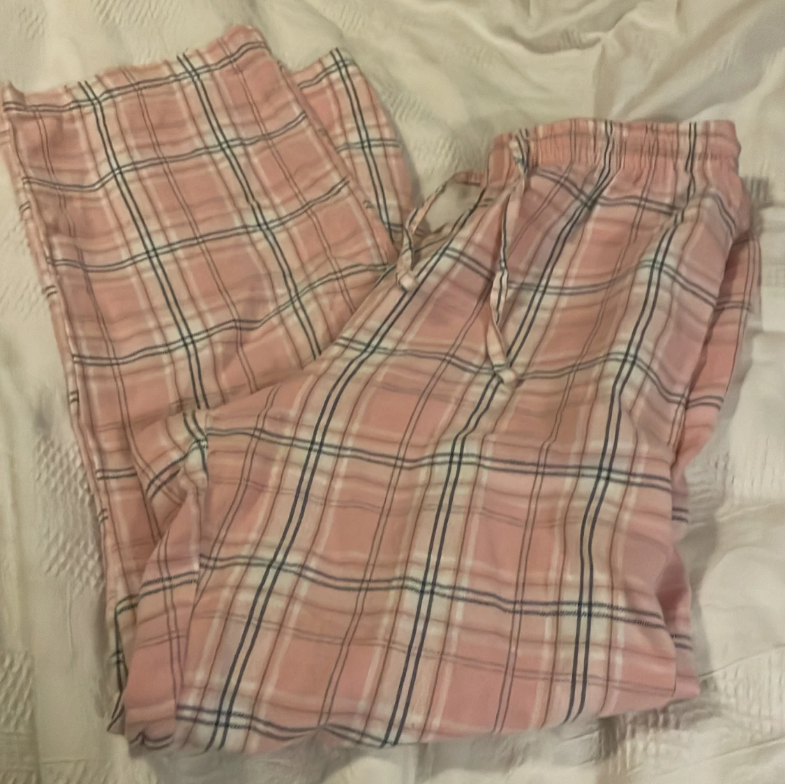 Rosa rutiga pyjamas set  från 157