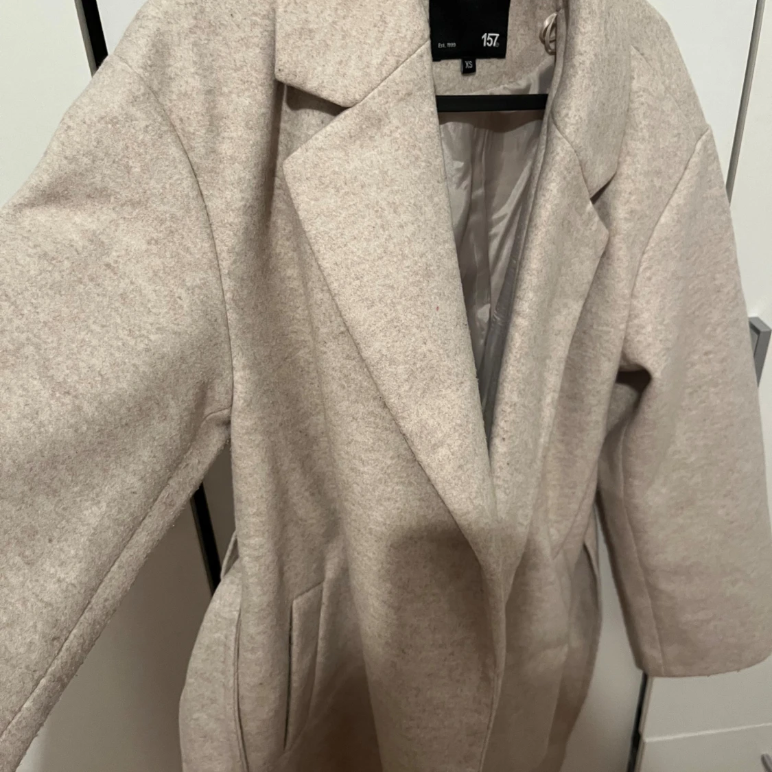 Beige kappa från 157 i ullmix XS - 1