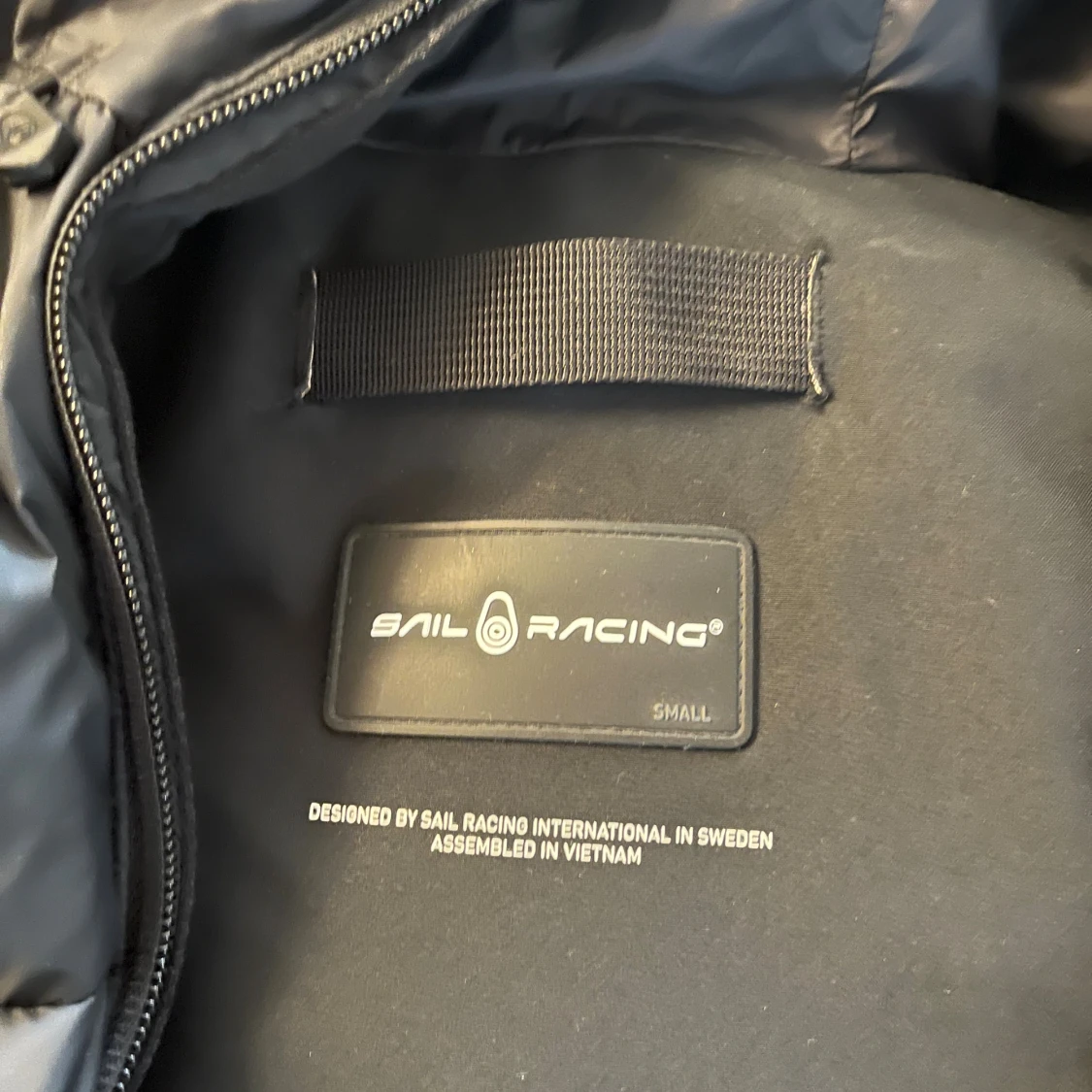 Svart pufferjacka från Sail Racing - 2