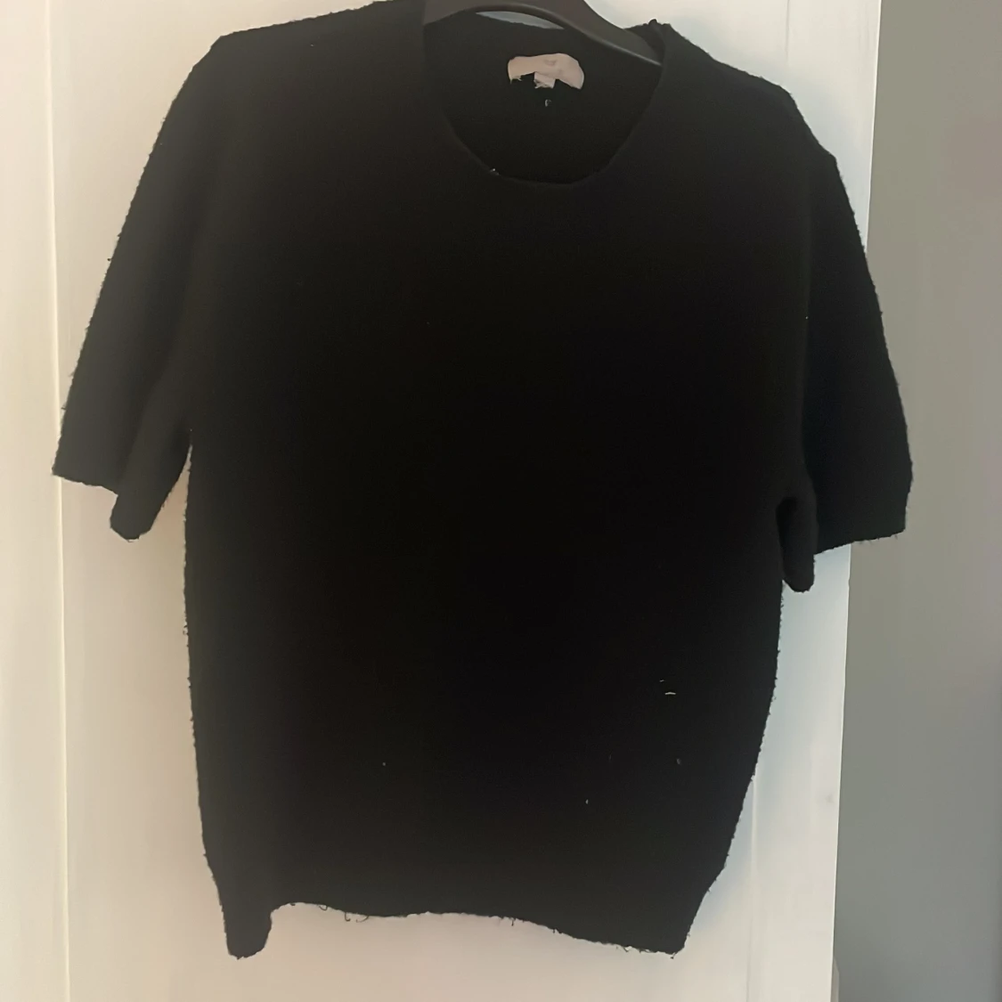 Svart stickad tröja från H&M