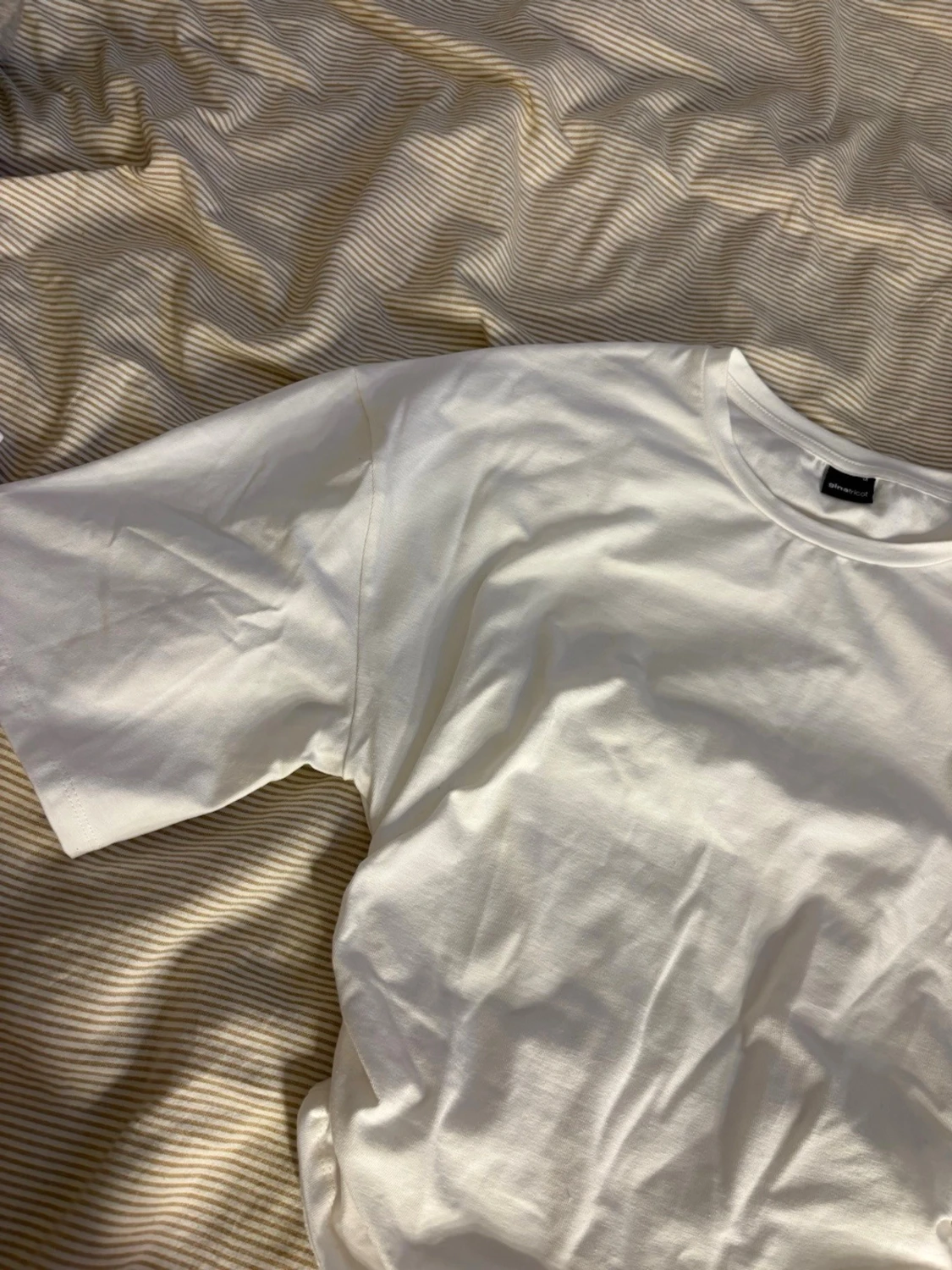 Vit oversized t-shirt från Gina Tricot - 1