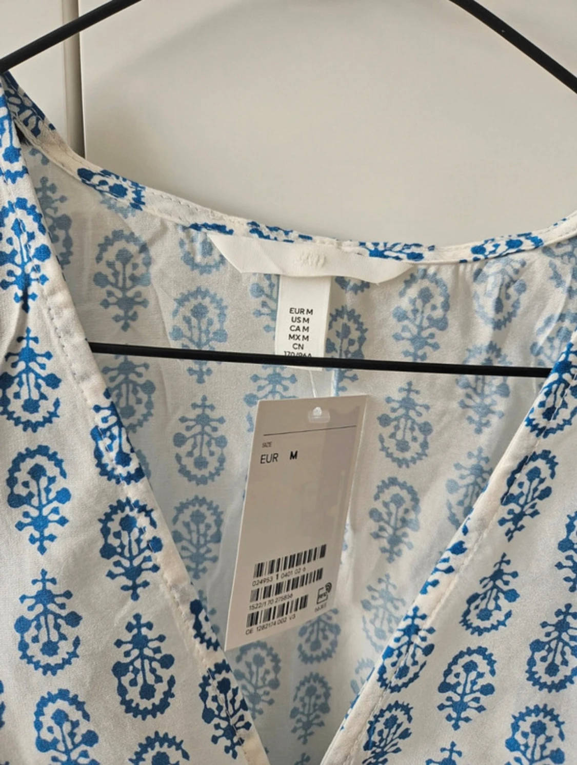 Mönstrad blå blus HM - 1