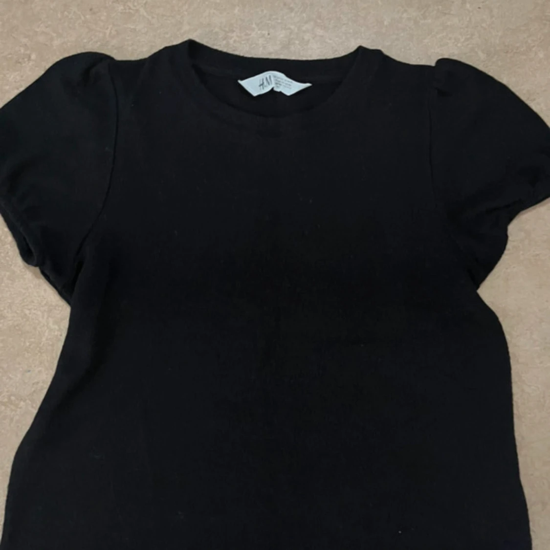 Svart kortärmad topp från H&M