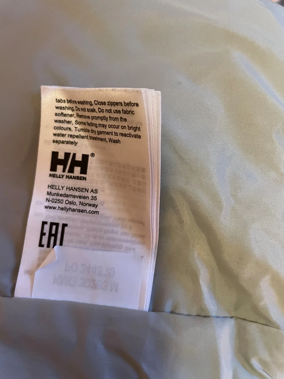 Vit vindjacka från Helly Hansen L - 4