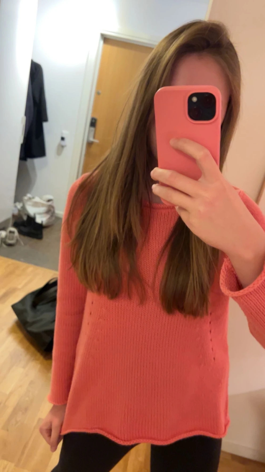 Korallrosa stickad tröja