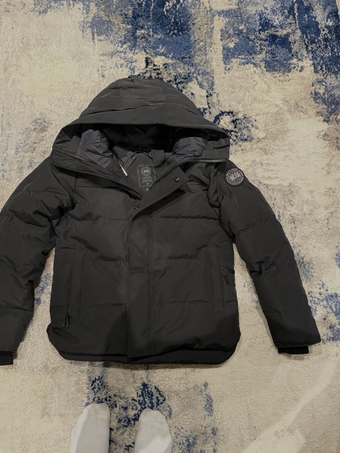 Svart canada goose macmillan