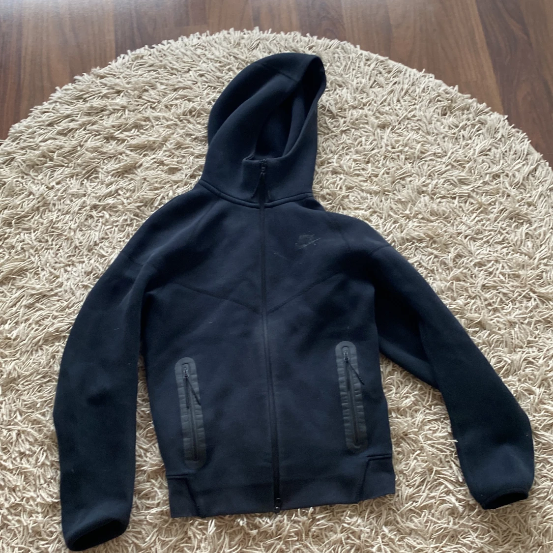 Svart hoodie från Nike XS