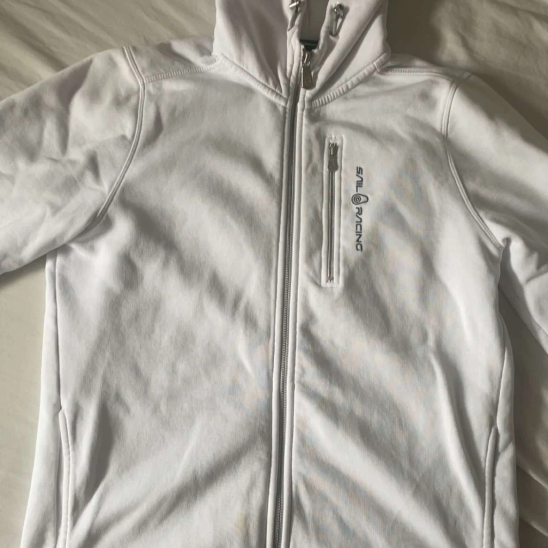 Vit fleecejacka från Sail Racing