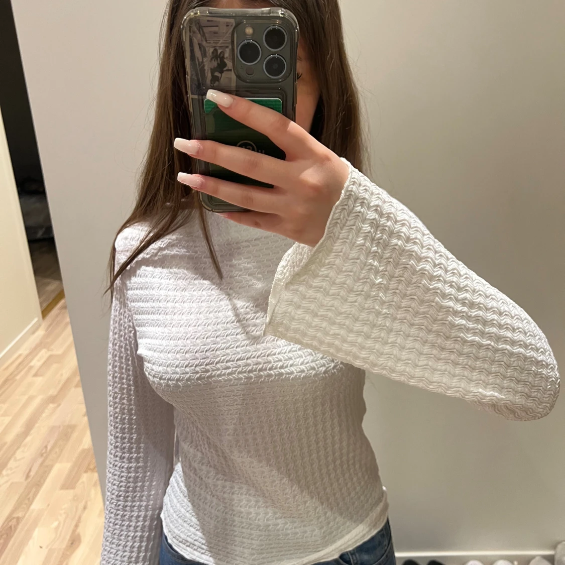 Vit ribbad långärmad topp