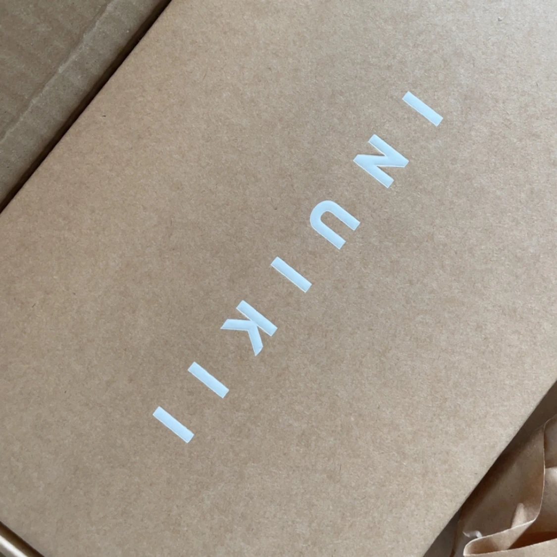 Inuikii tofflor i storlek 39