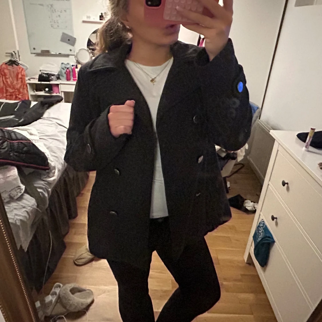 Svart skepparkavaj med knappar