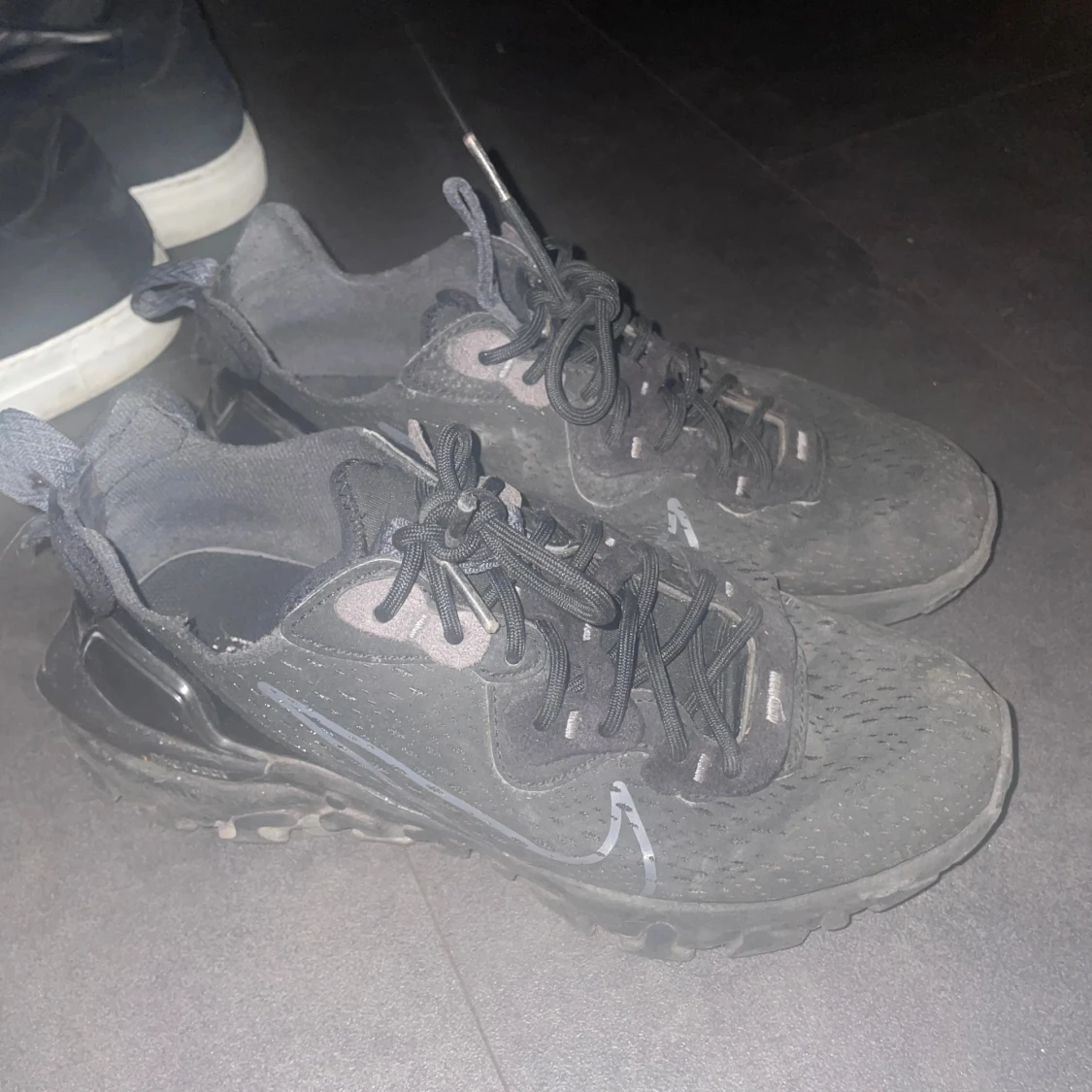 Svarta Nike React sneakers