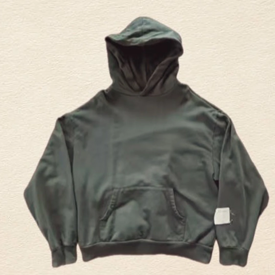 Mörkgrön hoodie med huva