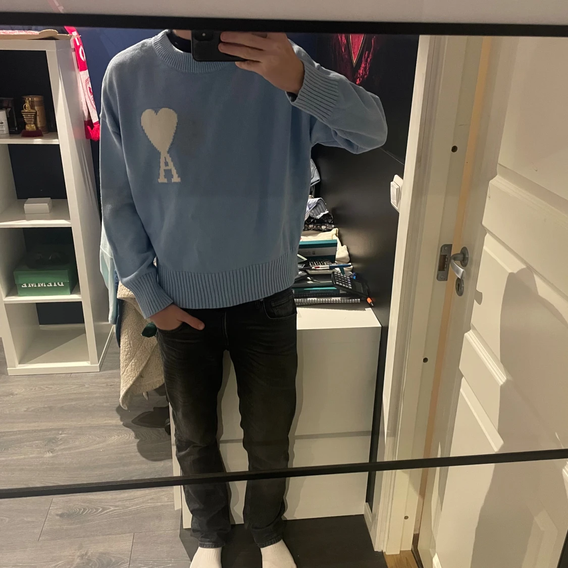 Ljusblå stickad tröja från Ami Paris