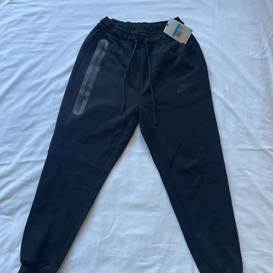 Nike tech byxor svart