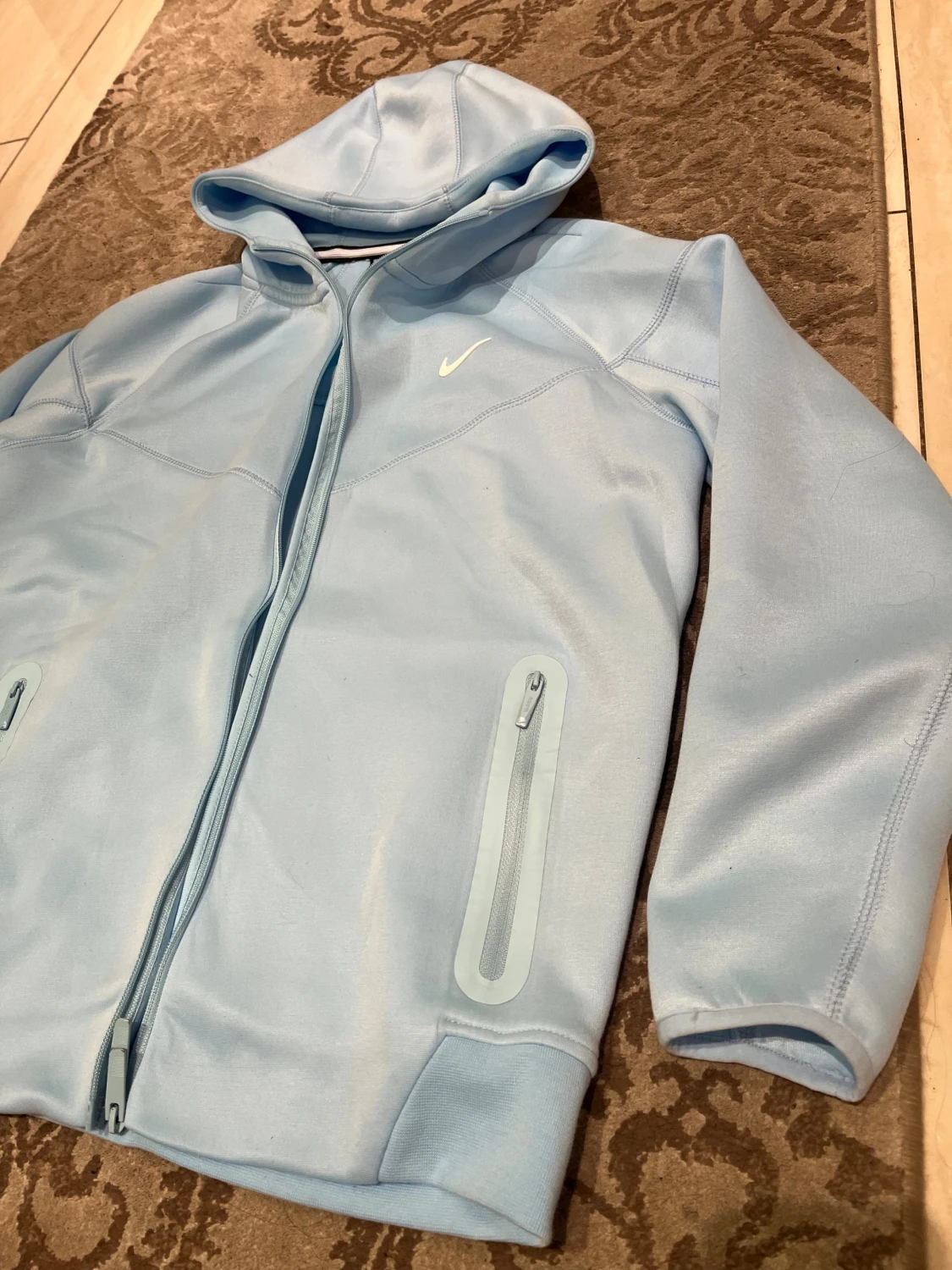 Ljusblå Nike NOCTA hoodiejacka - 1