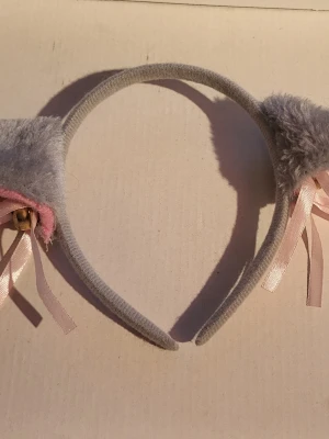 Animal ears headband - Soft headband with ears, bells, and bows. Width without ears 10cm Total width 19.7cm Height 13cm  Bundle discounts: two items 10% off (automatic) three items 15% off, five items 20% off. Message me before purchasing 3+ items for discount.