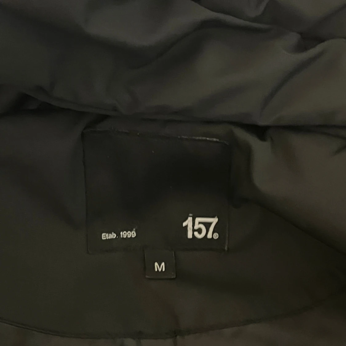 Svart lång pufferjacka från 157 - 1