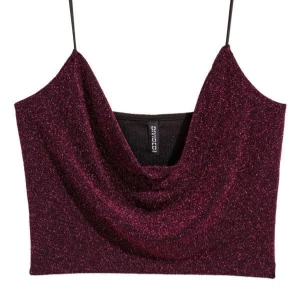 Vinröd glittrig croppad linnetopp - Säljer en vinröd glittrig croppad linnetopp 