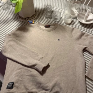 En grå moris tröja  - använd 2 gånger 