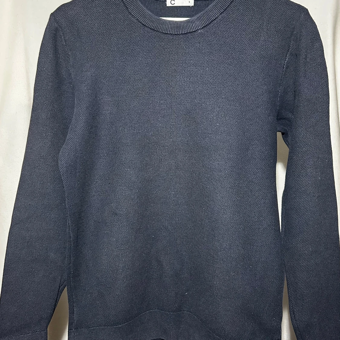 Blå stickad tröja