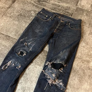 Dry Nudie Jeans - Bootcut Ola - Helt störda bootcut ola i strlk 31/34, jeansen är från 2006 alltså snart 20 år gamla👏