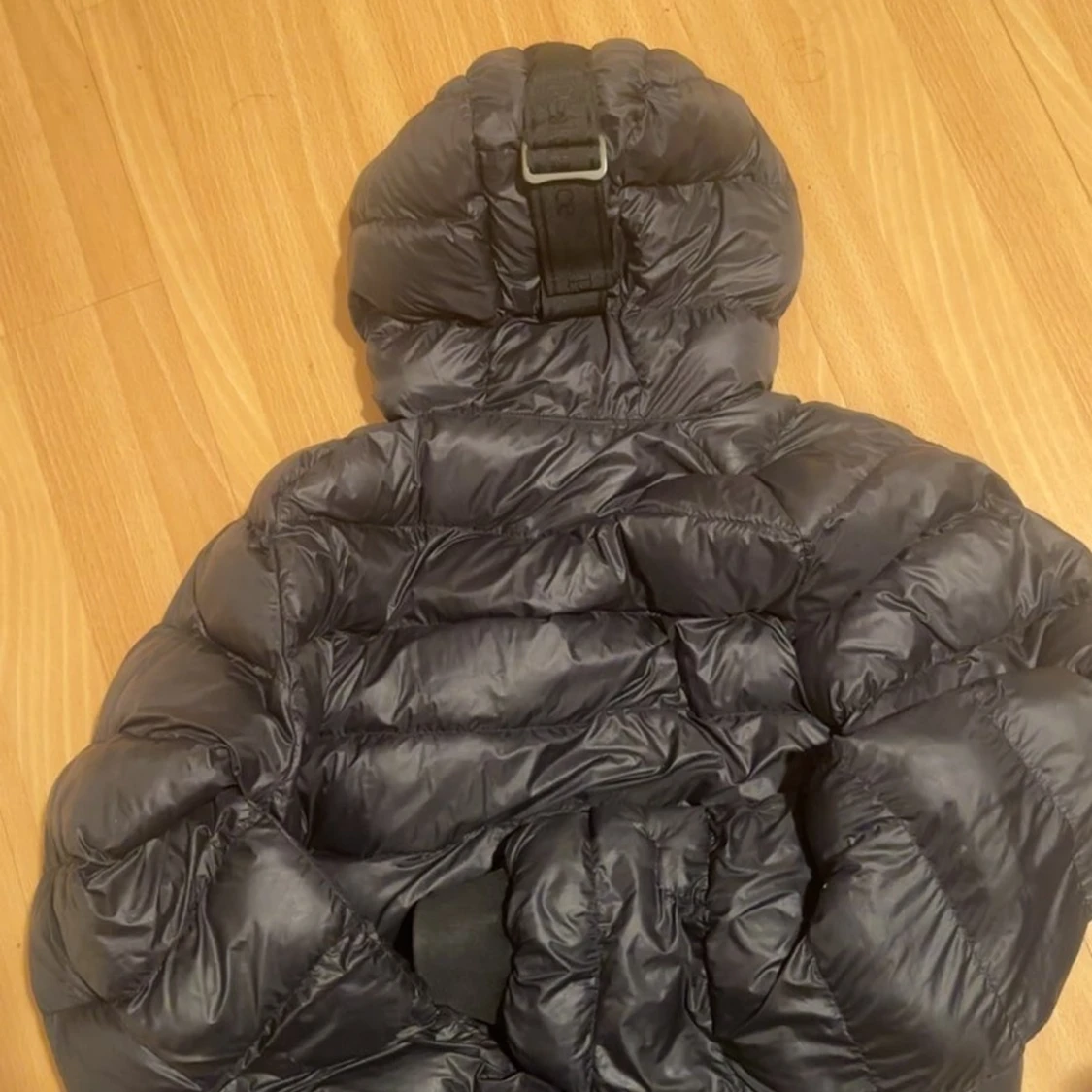 Svart dunjacka Peak Performance M - 4