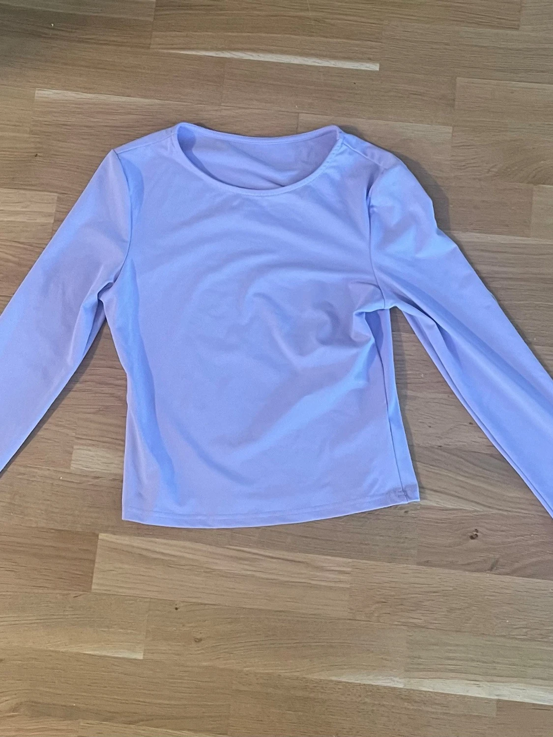 Ljuslila långärmad topp