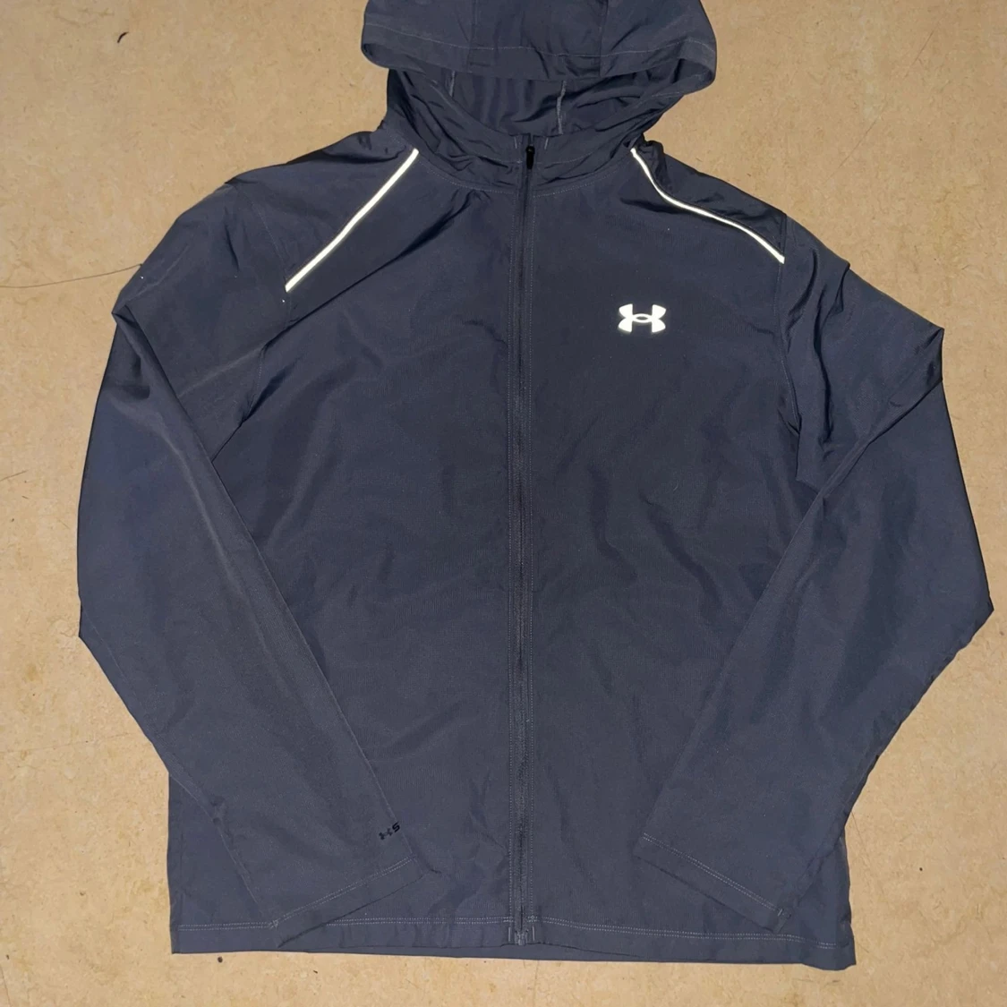 Svart vindjacka från Under Armour M