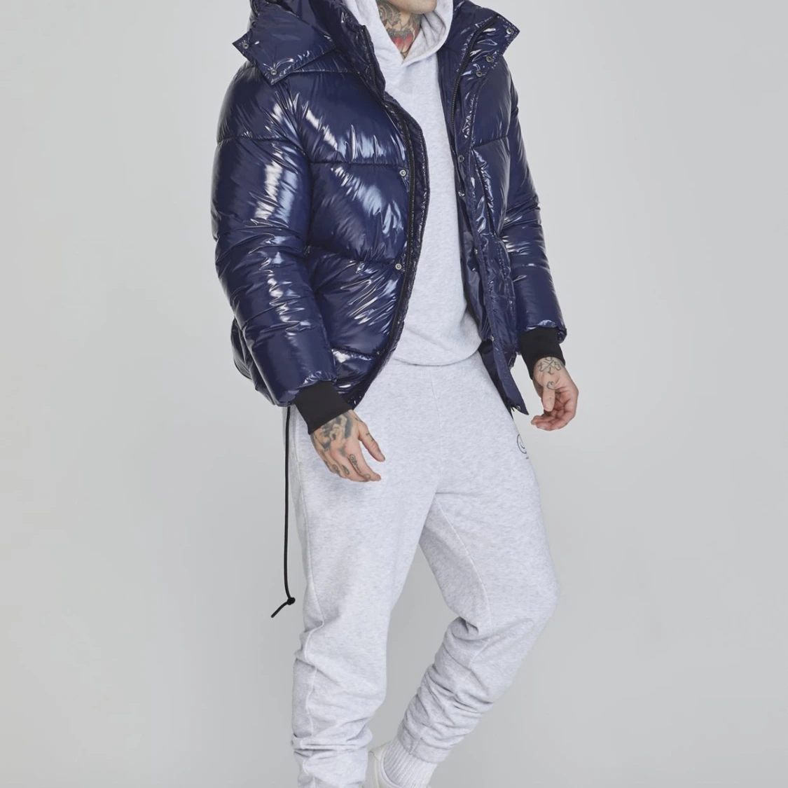 Mörkblå pufferjacka med huva - 1