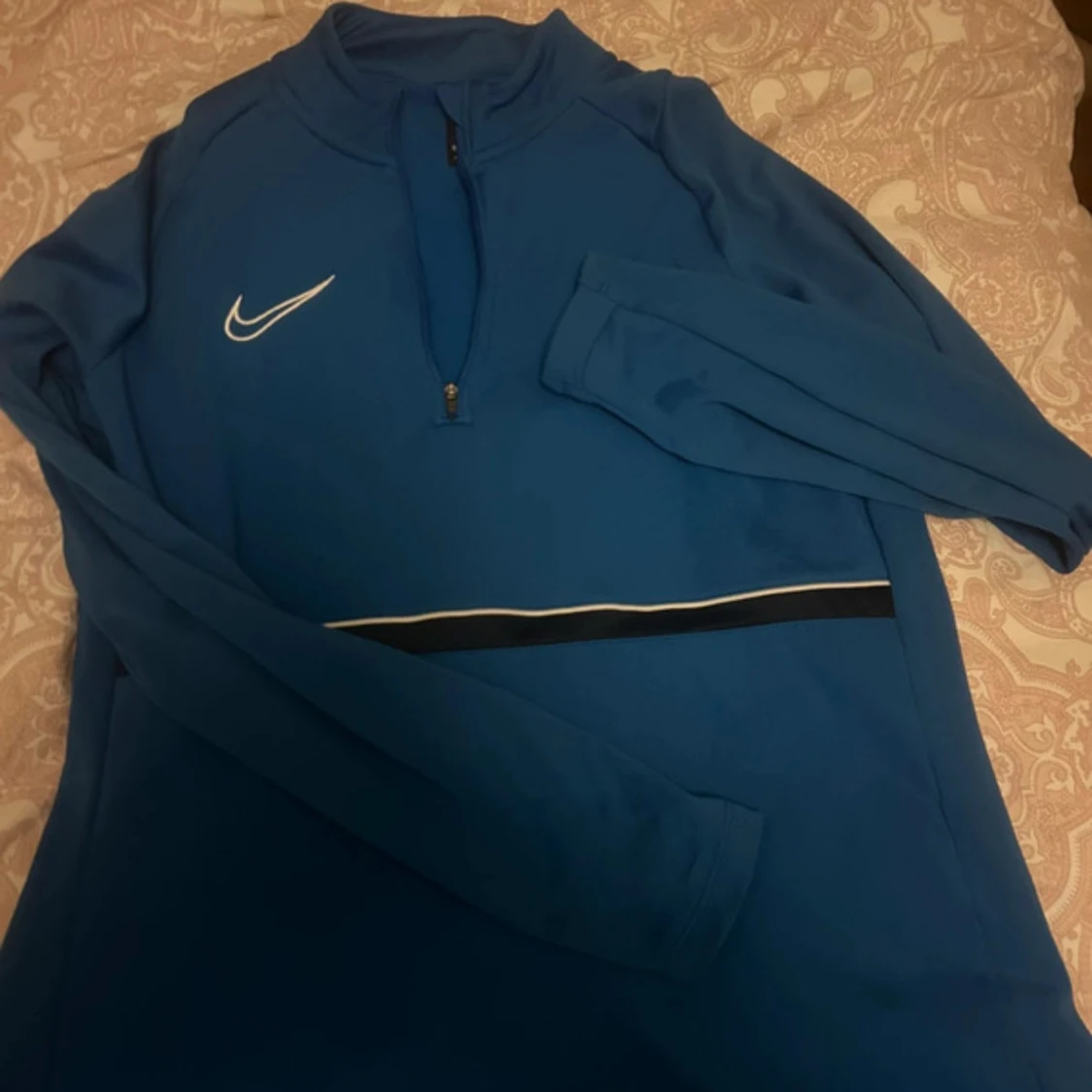 Blå Nike Dri-Fit half zip tröja