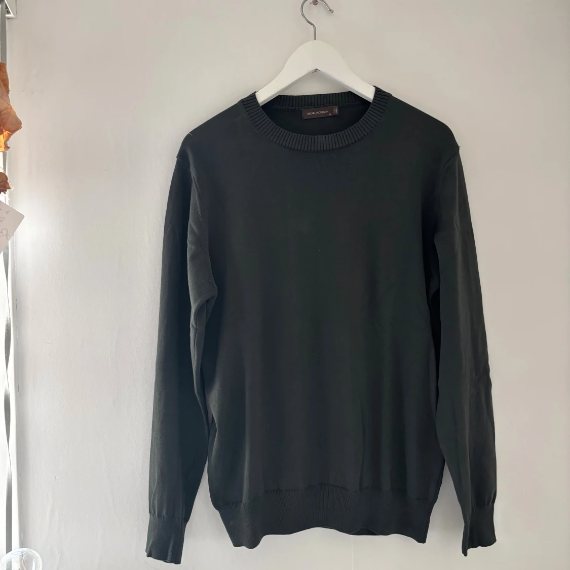 Svart långärmad tröja från Oscar Jacobson