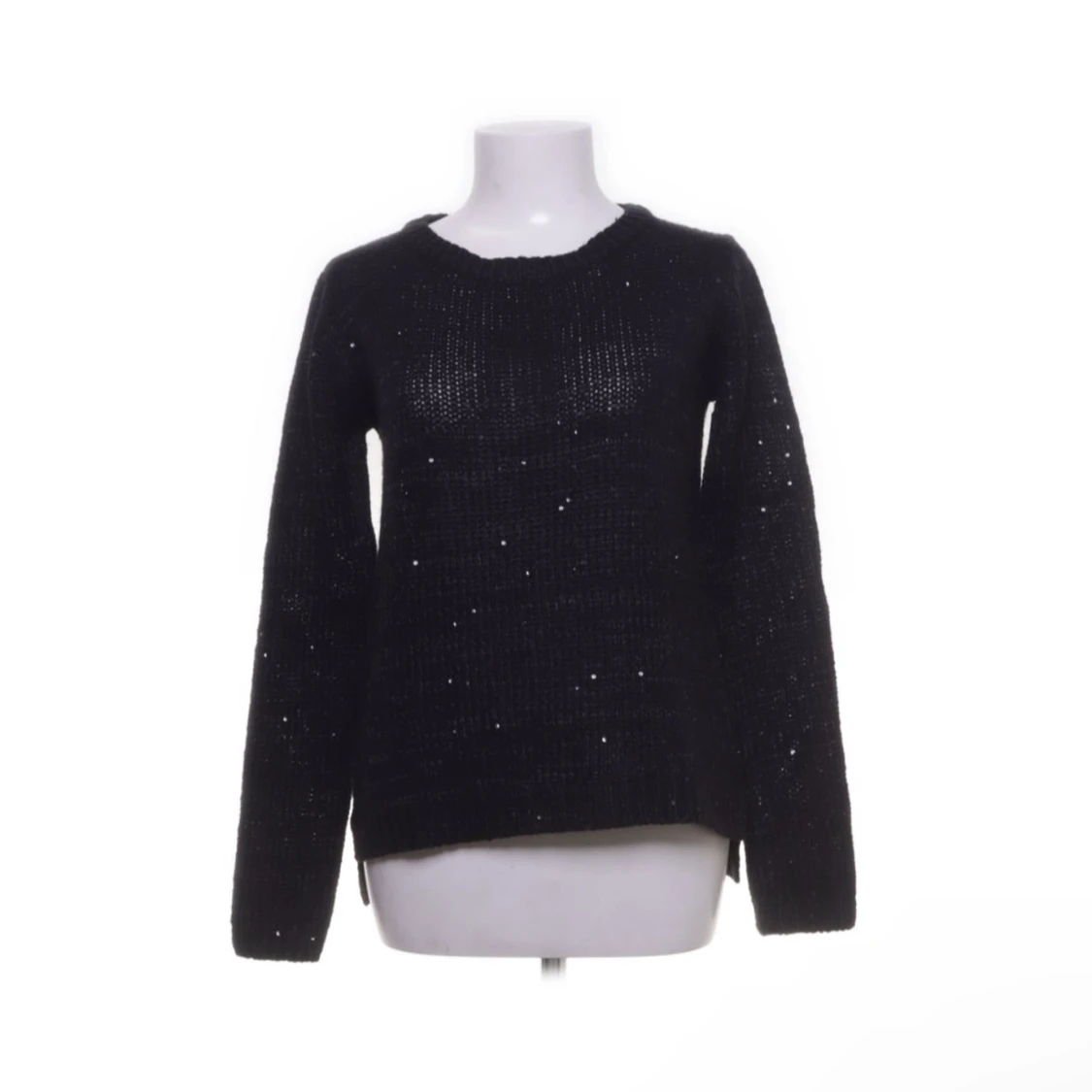 Glittrig stickad tröja