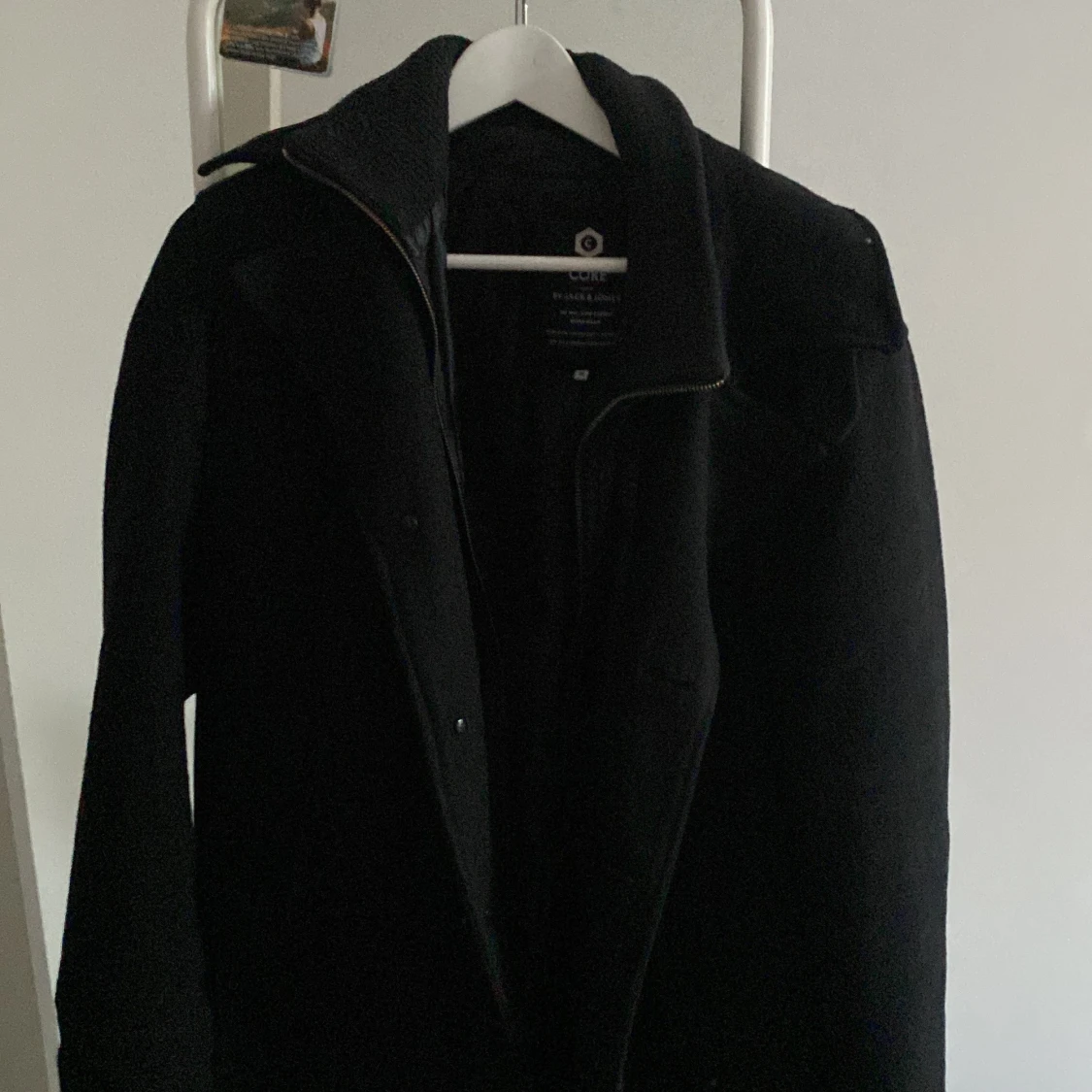 Vintage kappa med knappar och dragkedja