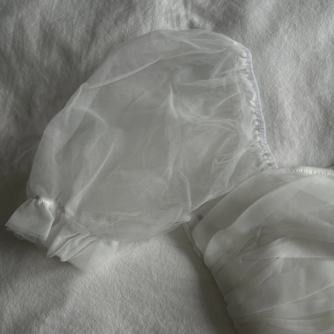 Croptop med meshärmar  - 91