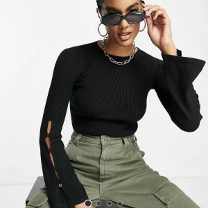 Stickad Body Asos - Stickad body i svart från 4th Reckless, köpt från asos. Oanvänd och prislapp kvar