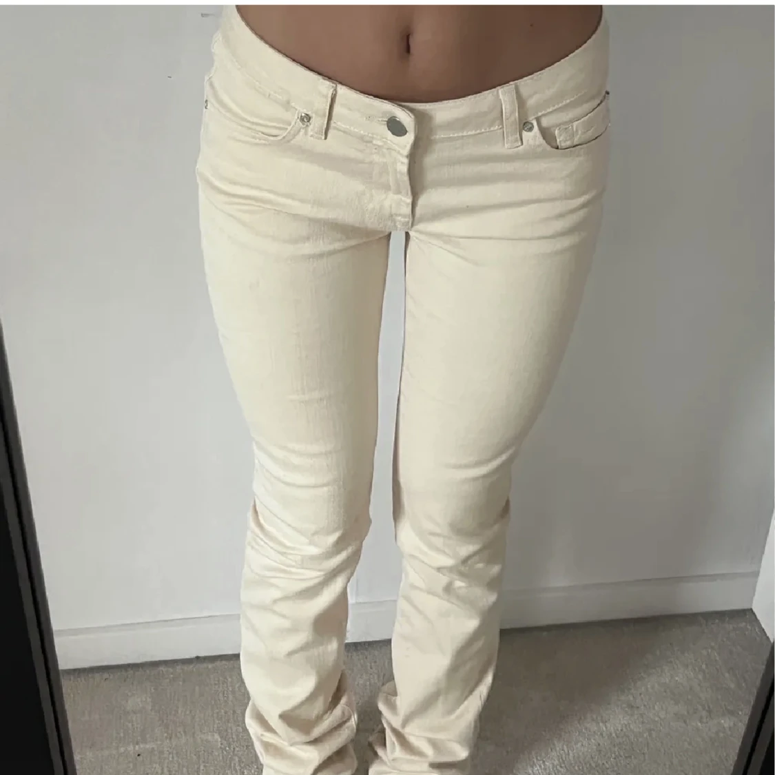 Lågmidjade beigea byxor - 90